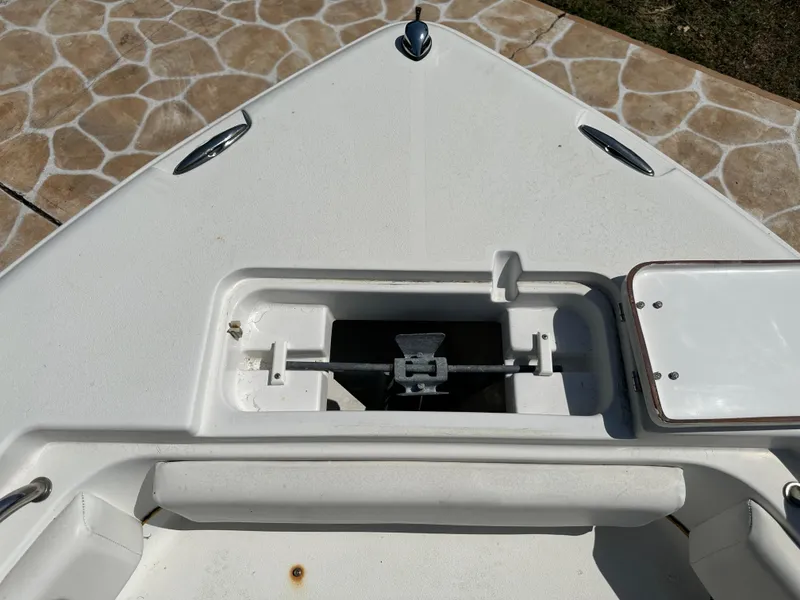 Slide: The Image of Bow of 2013 Sea Hunt Ultra 225 boat with anchor storage compartment. - 43