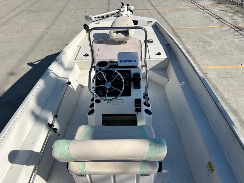 Slide: The Image of 2019 G3 Bay 20 boat interior with steering console and seating. - 5