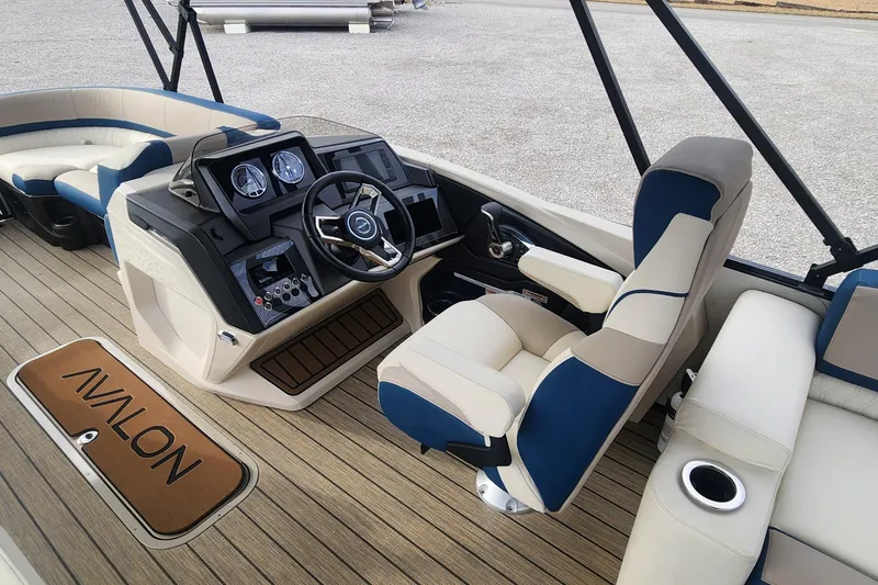 Slide: The Image of 2025 Avalon Platinum Catalina 2785 Quad Lounger Shift interior with luxurious seating and modern dashboard. - 7