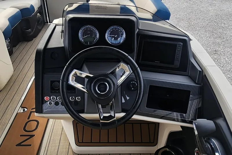 Slide: The Image of Steering console of 2025 Avalon Platinum Catalina 2785 Quad Lounger Shift boat. - 8