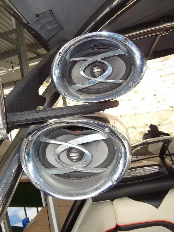 Slide: The Image of 2010 Malibu VLX WAKESETTER boat speakers, chrome finish, mounted on wakeboard tower. - 24