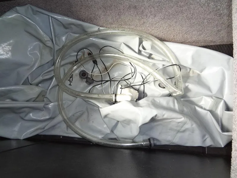 Slide: The Image of 2010 Malibu VLX WAKESETTER ballast system with hoses and wiring. - 26