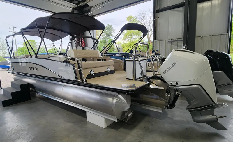 Slide: The Image of 2025 Avalon Platinum Catalina 2585 Cruise Rear Bench pontoon boat in showroom. - 4