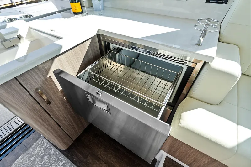 Slide: The Image of Open drawer in 2022 Regal 38 XO yacht kitchen, showcasing modern design and functionality. - 24