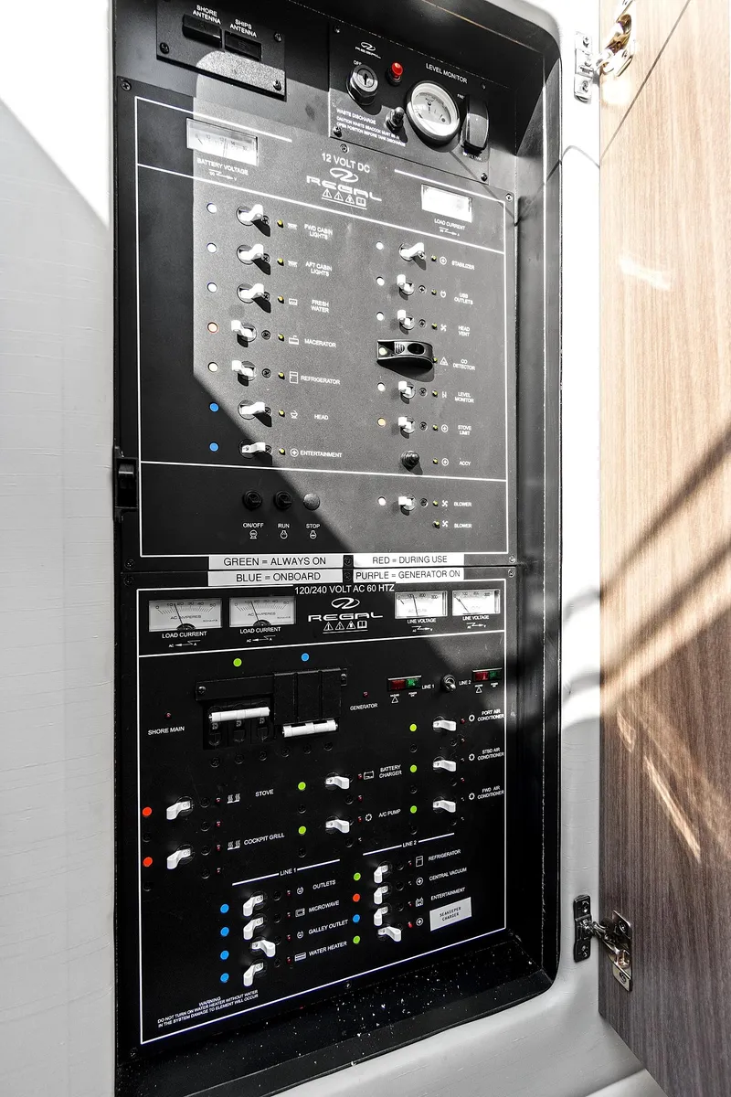 Slide: The Image of Electrical control panel on a 2022 Regal 38 XO yacht. - 37