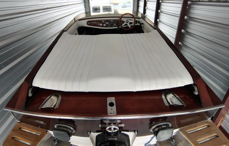 Slide: The Image of 1989 Kavalk Continental boat with white upholstery in storage unit. - 18
