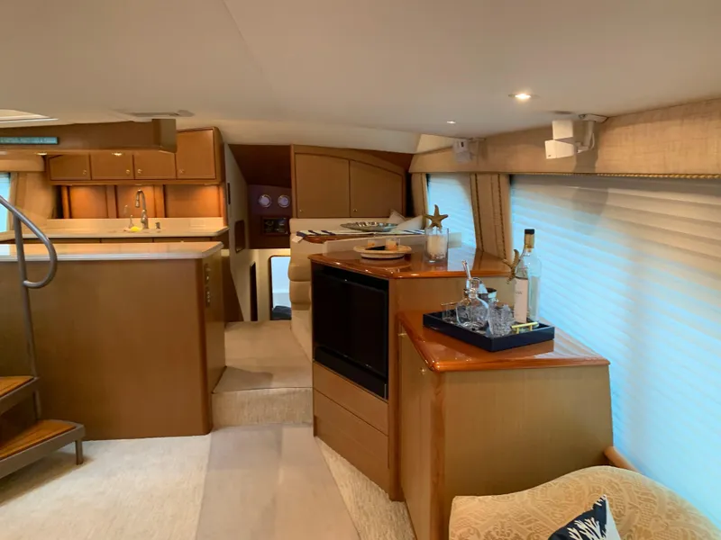 Slide: The Image of Luxurious interior of 2004 Ocean Yachts 57 Odyssey with modern kitchen and elegant decor. - 12