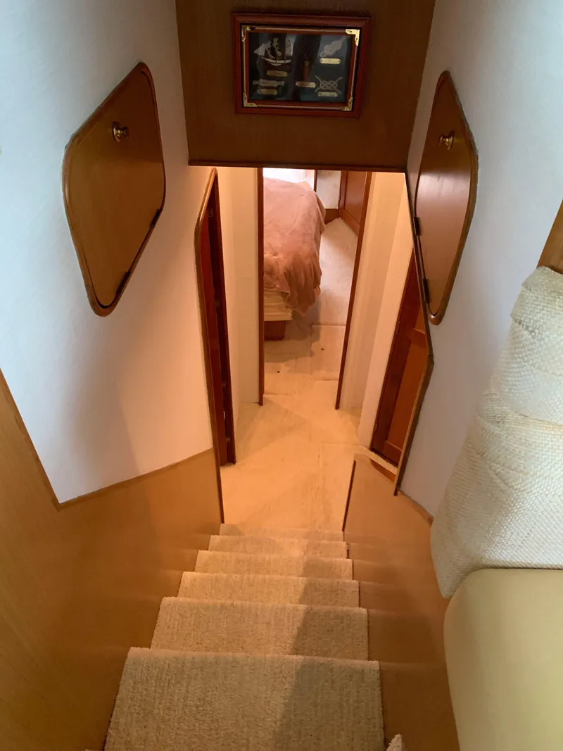 Slide: The Image of Interior staircase of 2004 Ocean Yachts 57 Odyssey, leading to lower cabin. - 23