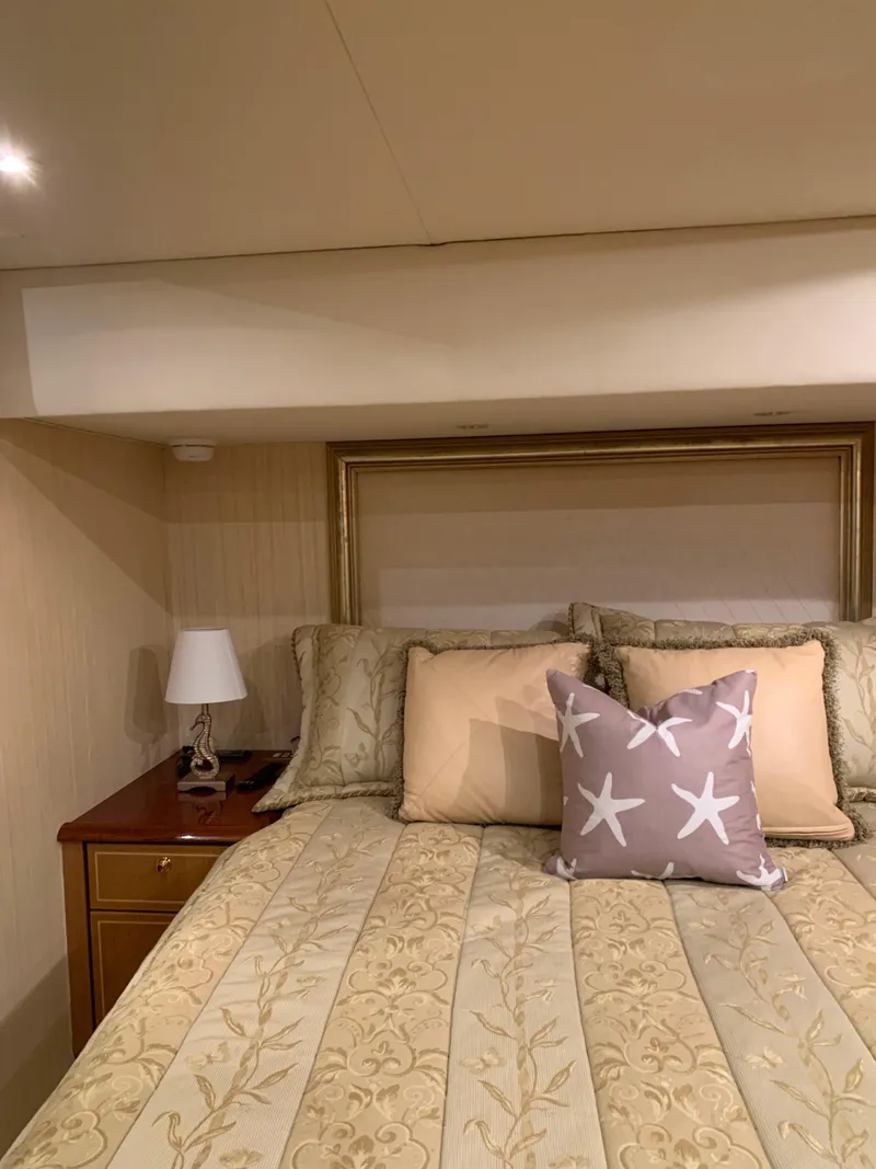 Slide: The Image of Luxurious bedroom interior of 2004 Ocean Yachts 57 Odyssey with elegant bedding and decor. - 36