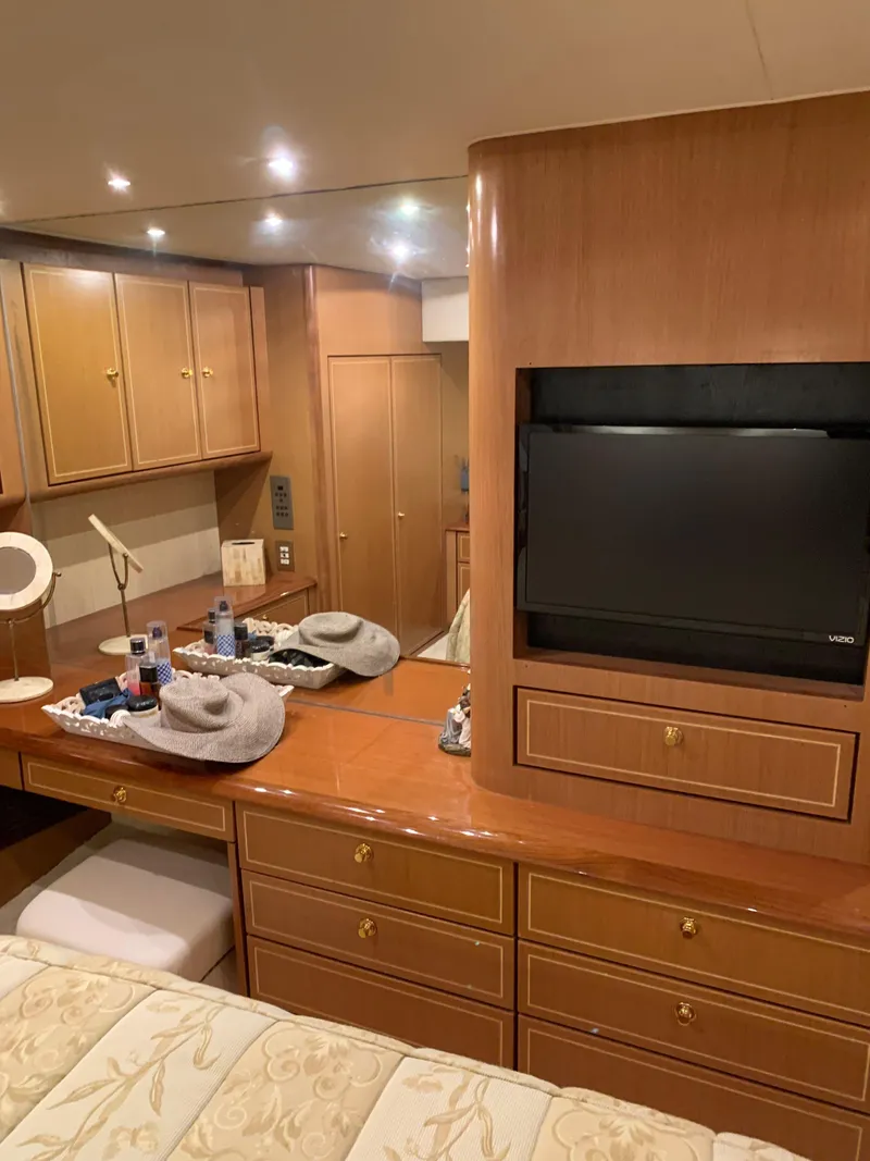 Slide: The Image of Luxurious interior of 2004 Ocean Yachts 57 Odyssey with wood cabinetry and modern amenities. - 39