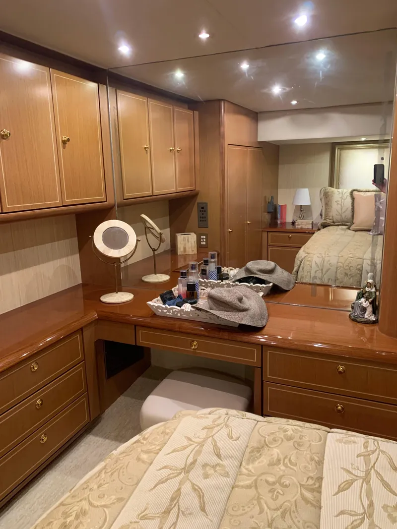 Slide: The Image of Luxurious cabin interior of 2004 Ocean Yachts 57 Odyssey with elegant wood cabinetry. - 40