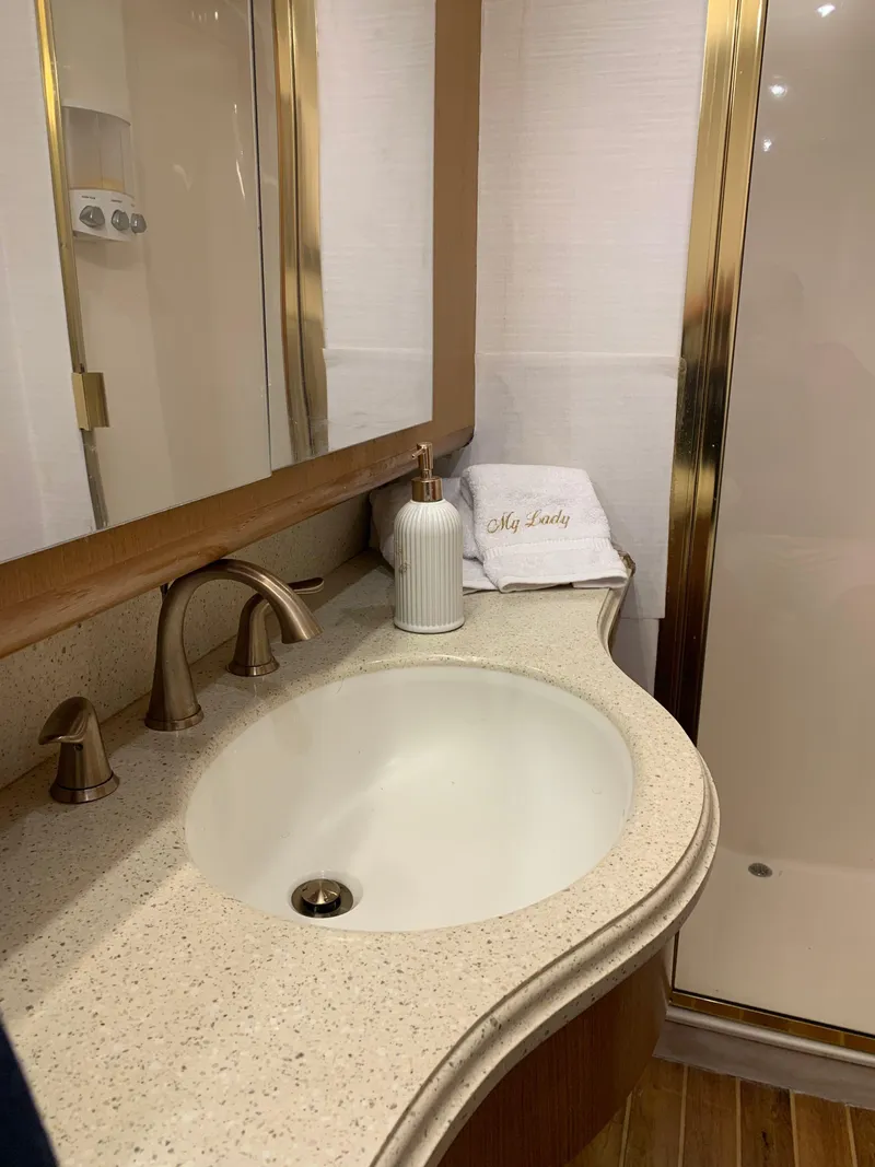 Slide: The Image of Luxurious bathroom in 2004 Ocean Yachts 57 Odyssey with elegant fixtures and modern design. - 44