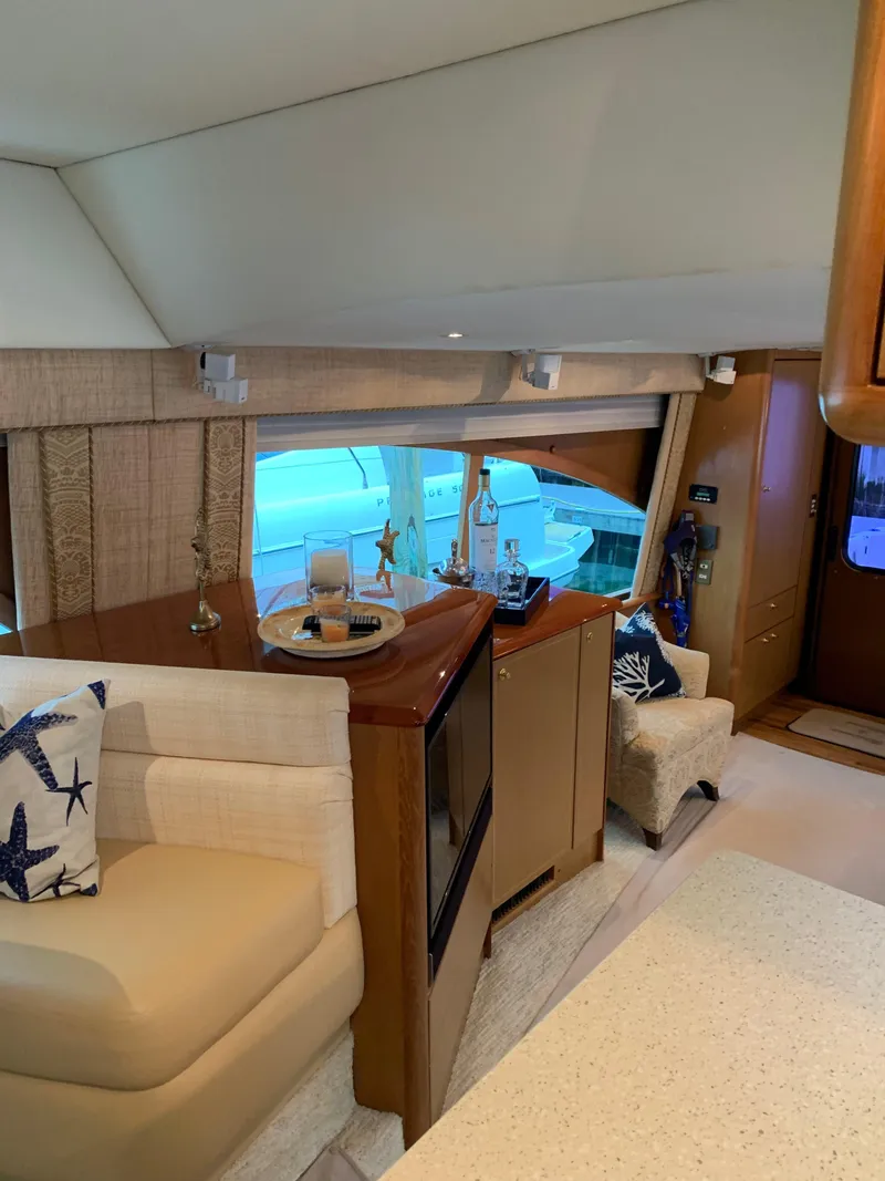 Slide: The Image of Luxurious interior of 2004 Ocean Yachts 57 Odyssey with elegant seating and decor. - 17