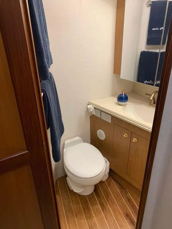 Slide: The Image of Bathroom interior of 2004 Ocean Yachts 57 Odyssey with wooden flooring and modern fixtures. - 41