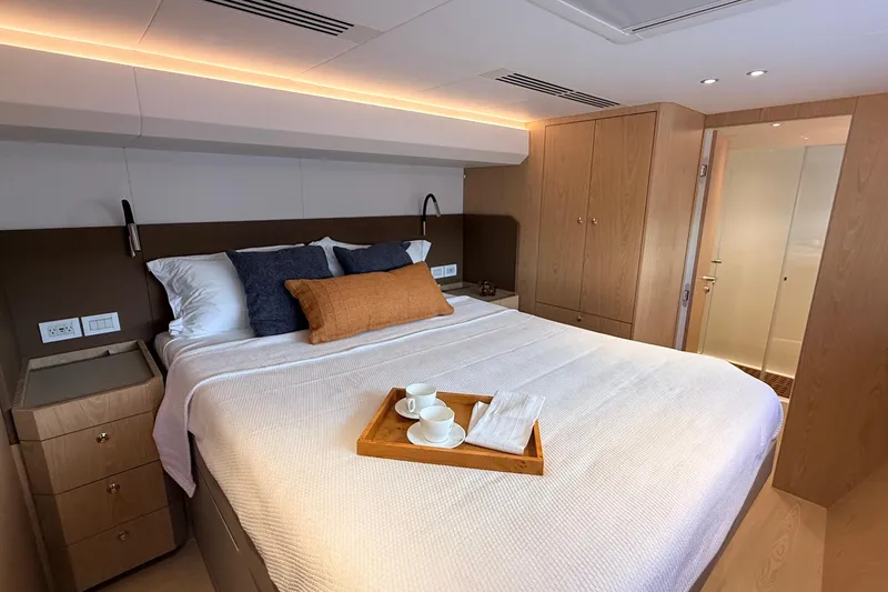 Slide: The Image of Luxurious Granocean W72 yacht bedroom with elegant decor and cozy bedding, 2025 model. - 23