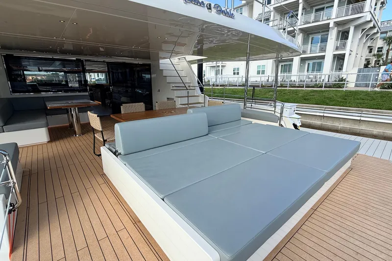 Slide: The Image of Luxurious Granocean W72 yacht deck with seating and dining area, 2025 model. - 26