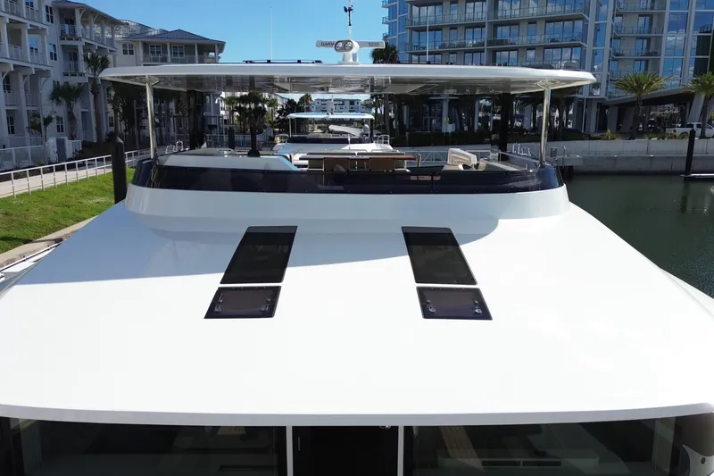 Slide: The Image of Luxury Granocean W72 yacht docked, showcasing sleek design and modern architecture, 2025 model. - 27