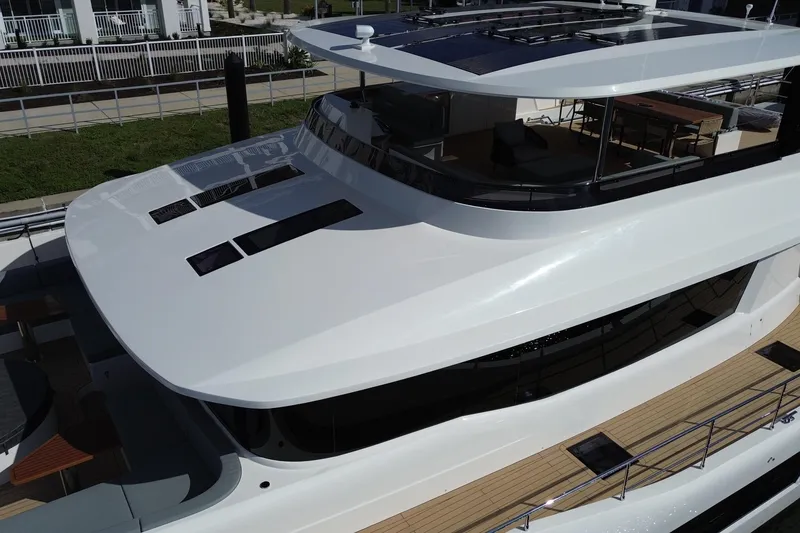 Slide: The Image of Luxurious 2025 Granocean W72 yacht with sleek design and spacious upper deck. - 6