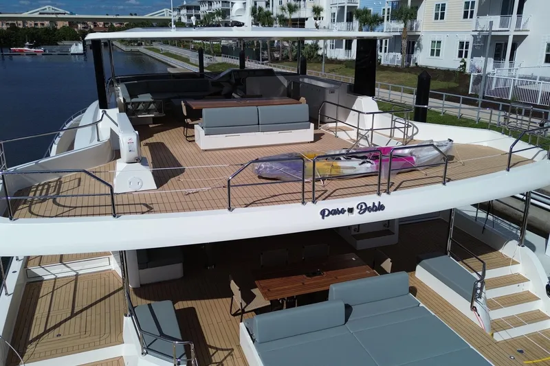 Slide: The Image of Luxurious 2025 Granocean W72 yacht with spacious deck and modern seating. - 8