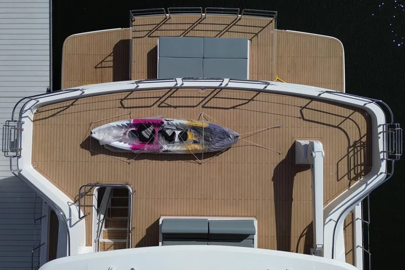 Slide: The Image of Aerial view of 2025 Granocean W72 yacht deck with a kayak. - 9