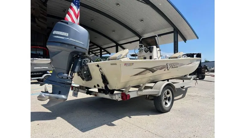 Slide: The Image of 2014 Express XP 18 CC boat on trailer with Yamaha outboard motor. - 3