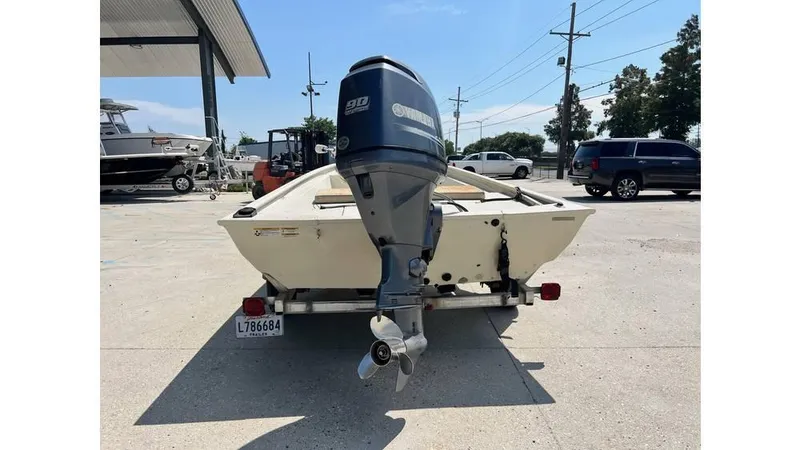 Slide: The Image of 2014 Express XP 18 CC boat with outboard motor on trailer. - 4