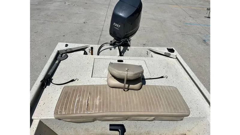 Slide: The Image of 2014 Express XP 18 CC boat with motor and seating on deck. - 6