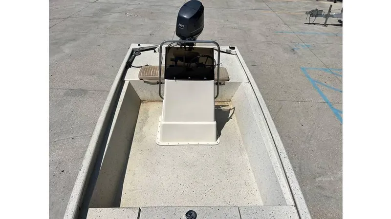 Slide: The Image of 2014 Express XP 18 CC boat with center console and outboard motor. - 8