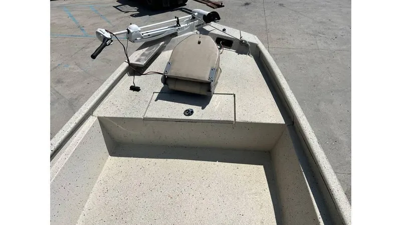 Slide: The Image of 2014 Express XP 18 CC boat deck with trolling motor and seating. - 9