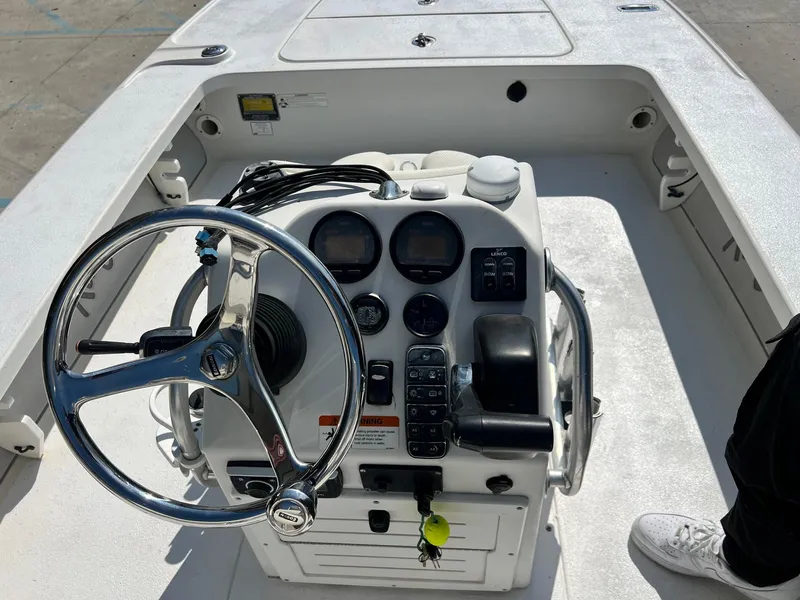 Slide: The Image of 2009 Ranger 184 Ghost boat console with steering wheel and controls. - 7