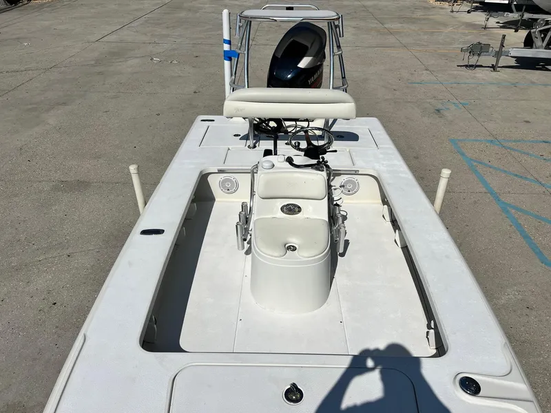 Slide: The Image of 2009 Ranger 184 Ghost boat with Yamaha motor in parking lot. - 8