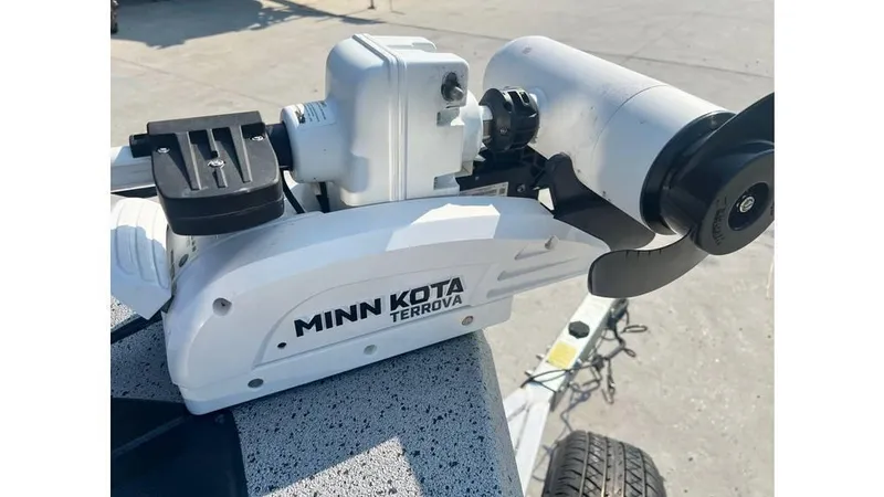 Slide: The Image of Minn Kota Terrova motor on Express H22B boat, 2023 model, outdoor setting. - 10