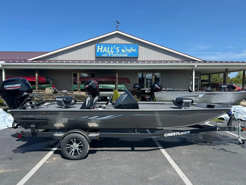 Slide: The Image of 2024 Crestliner XF 189 boat displayed at Hall's Marine dealership. - 1