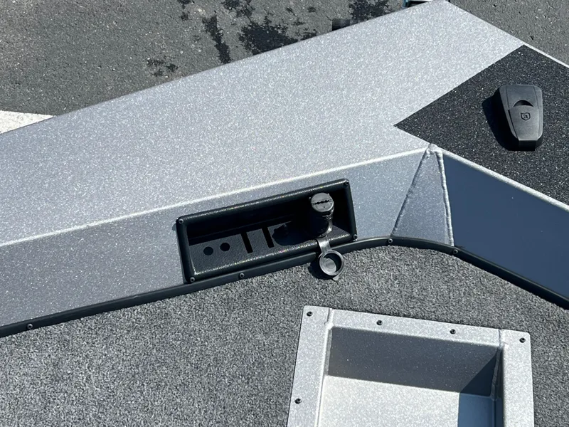 Slide: The Image of 2024 Crestliner XF 189 boat deck with storage compartment and accessory mount. - 5