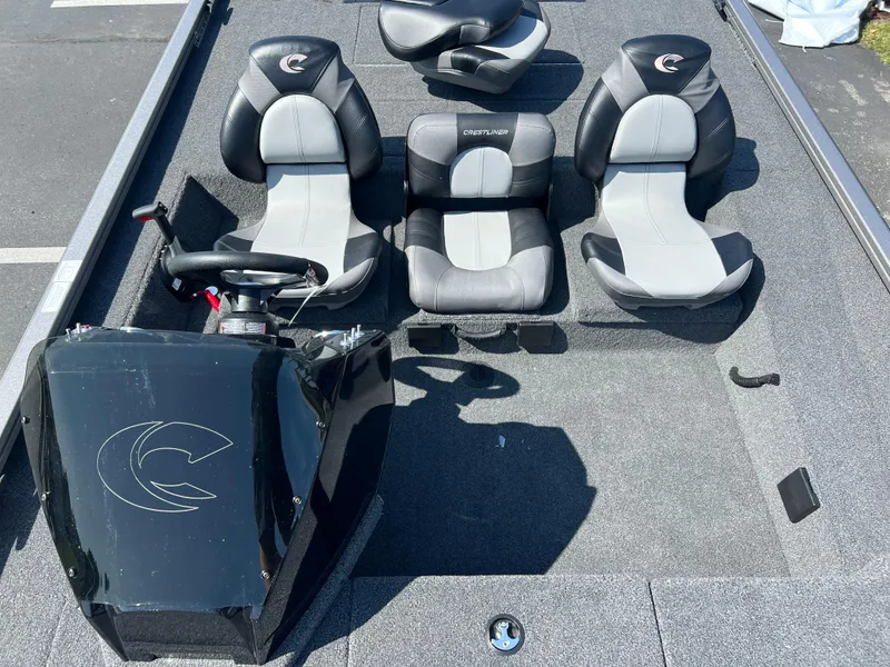 Slide: The Image of 2024 Crestliner XF 189 boat interior with four seats and steering console. - 9