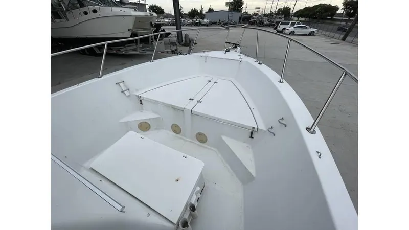 Slide: The Image of 1998 Sunbird 230 CC boat undergoing performance test at a boat yard facility. - 7