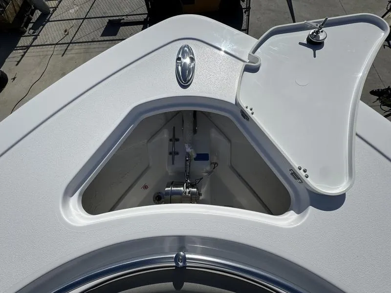 Slide: The Image of Open anchor compartment on 2025 Sportsman Open 282 boat. - 16