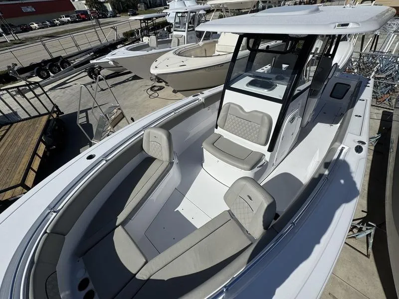 Slide: The Image of 2025 Sportsman Open 282 boat with spacious seating and modern design. - 18