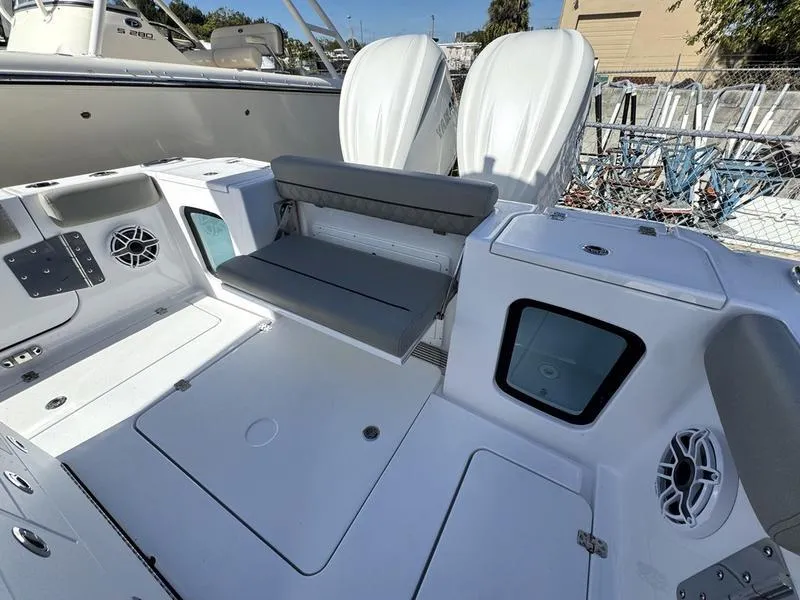 Slide: The Image of 2025 Sportsman Open 282 boat interior with seating and storage compartments. - 39