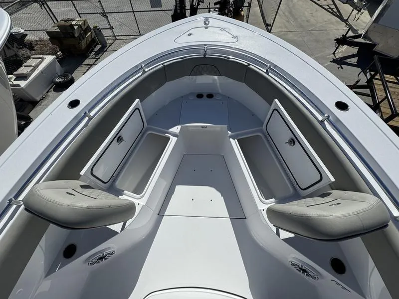 Slide: The Image of 2025 Sportsman Open 282 boat with spacious seating and storage compartments. - 7
