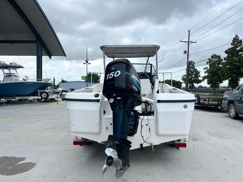 Slide: The Image of Dashboard of a 1997 Bayliner 1802 FJ boat with steering wheel and gauges. - 4