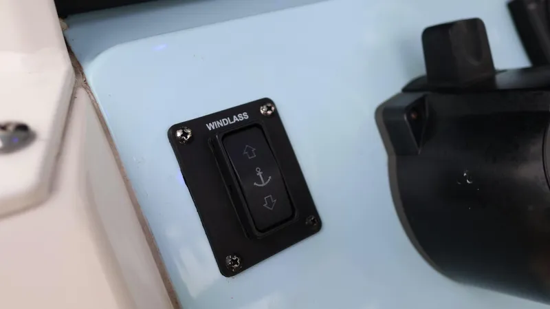 Slide: The Image of Windlass control panel on 2023 Cobia 280 Center Console boat. - 17