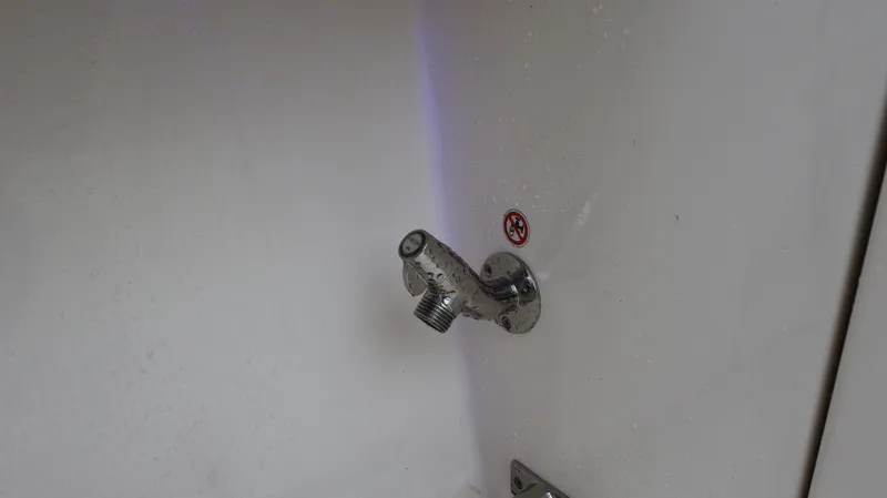 Slide: The Image of Boat water outlet on 2023 Cobia 280 Center Console. - 37