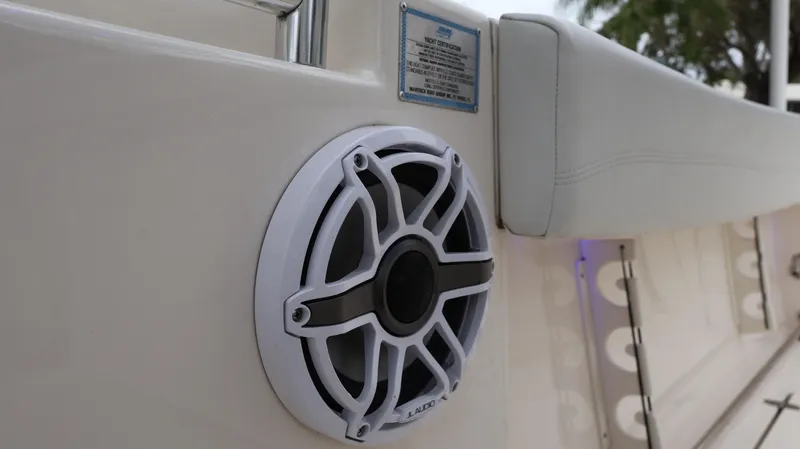 Slide: The Image of 2023 Cobia 280 Center Console boat speaker detail. - 38