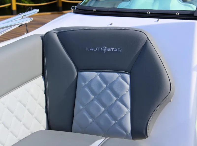 Slide: The Image of 2024 NauticStar DC Deck boat seat with quilted gray upholstery. - 7