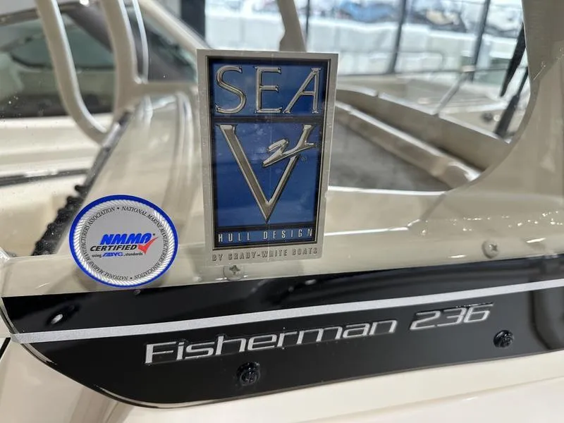 Slide: The Image of 2025 Grady-White Fisherman 236 boat with Sea V2 hull design and NMMA certification. - 16
