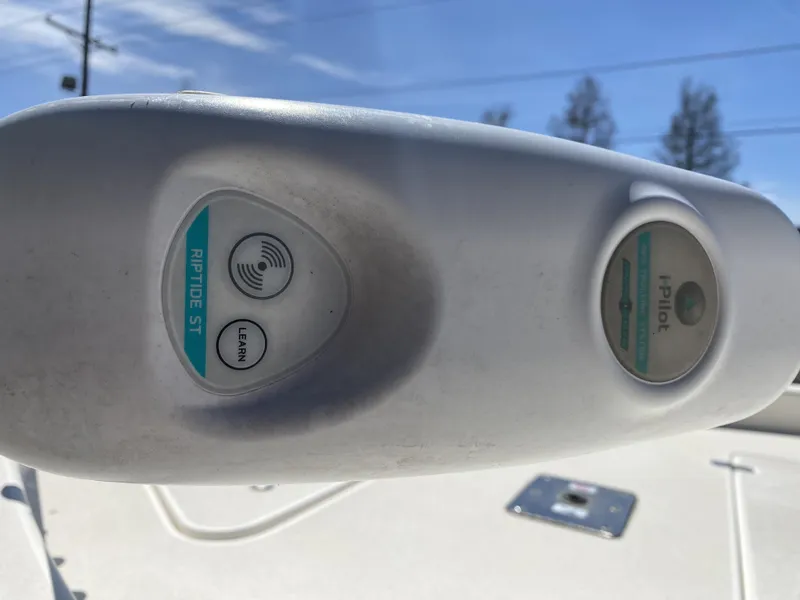 Slide: The Image of Close-up of Riptide ST iPilot control on 2013 ShearWater 25LTZ boat. - 18