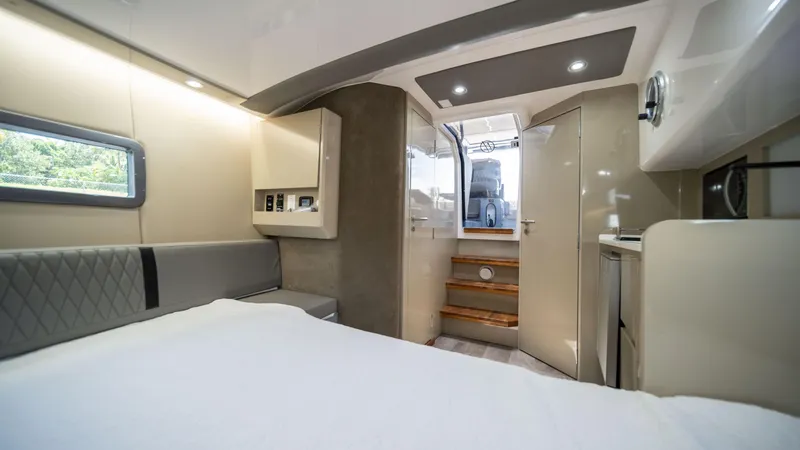 Slide: The Image of Interior of 2025 Hanover 387 Outboard boat, featuring modern design and comfortable seating. - 39