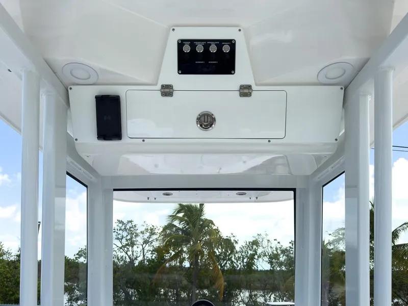 Slide: The Image of 2025 Sea Fox 248 Commander boat console with storage and control panel. - 12