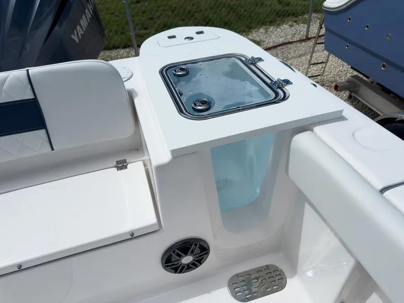 Slide: The Image of 2025 Sea Fox 248 Commander boat interior with storage compartment and speaker. - 20